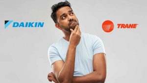 Technician comparing Daikin and Trane HVAC units during service at Eagle Air Co